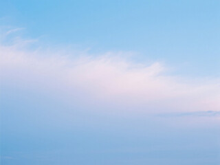 Obraz premium Pastel sky with wispy clouds offering serene and tranquil atmospheric natural scenery