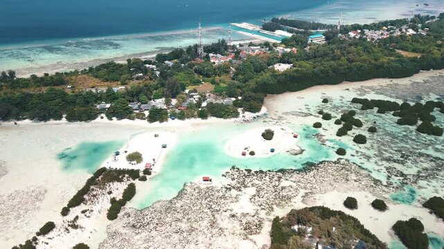 Aerial shot of Thousand Island, Indonesia Island of Pularu Pari