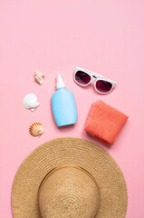 Summer Vacation Essentials on Tropical Beach — Top View Composition with Towel, Hat, and Sunglasses

