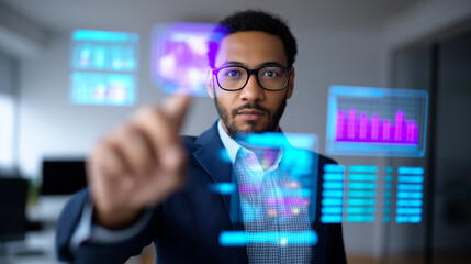 Businessman interacting with futuristic digital interface displaying data and analytics in modern office.
