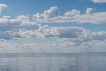 Cloudy nice day with large and many colds above Baltic Sea of nice sunny summer days