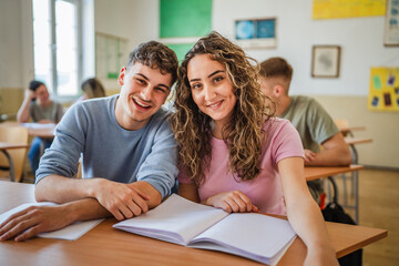 Obraz premium Portrait of students during lecture in classroom at high school