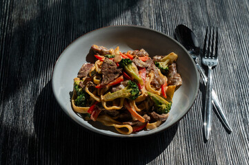 Pasta with beef, mushrooms and vegetables. 