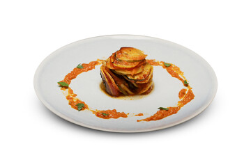ชื่อผลงาน: Elegant stack of sliced vegetables in tomato sauce, plated with artistic sauce ring and herbs on a white plate, isolated on transparent background

