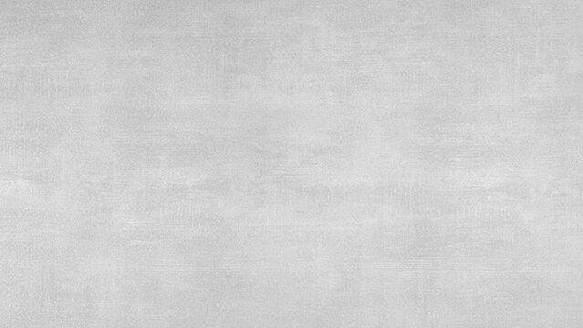 A white wall with a grey texture. The wall is empty and has no decoration. abstract texture background for template pages and banners