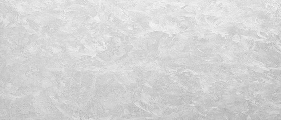 Obraz premium A white wall with a grey texture. The wall is smooth and has a clean, minimalist appearance texture as an abstract texture background for template pages and banners.