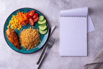Healthybalanced food plate with chicken and vegetables