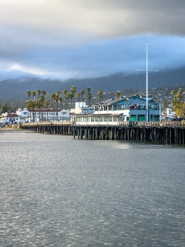 Scenic view of Stearns Wharf, Santa Barbara, California, USA against cloudy sky
