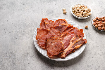 pork chips on a grey background