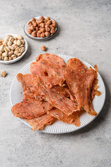 chicken dried chips on a grey background