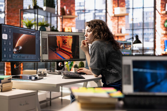 Woman using an AI chatbot interface to generate video game spaceship environments, modern system applies deep learning and machine learning techniques. Developing sci fi gaming designs.