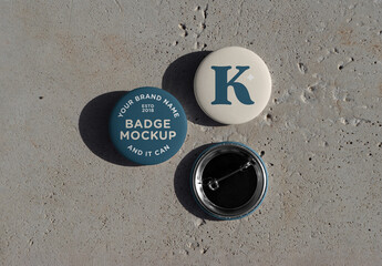 Three Badges on Concrete Floor Mockup