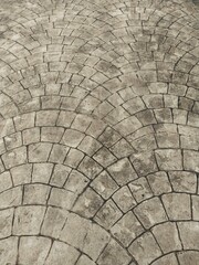 Intricate Fan-Shaped Stone Pavement Design A Detailed Architectural Texture
