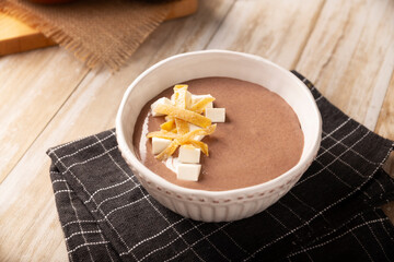 Bean soup. In Mexico known as Crema de Frijoles, a very easy and nutritious homemade food recipe, commonly accompanied with cheese, cream, avocado and corn tortilla cut into strips and fried.