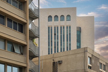 old real estate Israeli building with modern background highlights contrast in secondary housing market architecture
