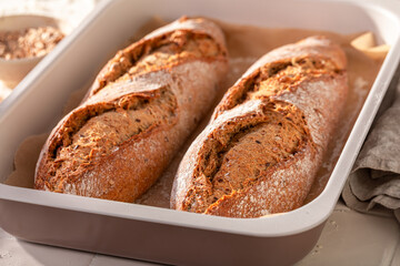 Fototapeta premium Homemade and tasty baguettes baked in home bakery.