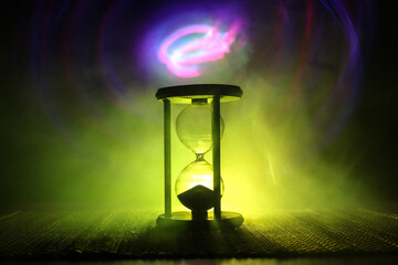 Hourglass as time passing concept for business deadline, urgency and running out of time....