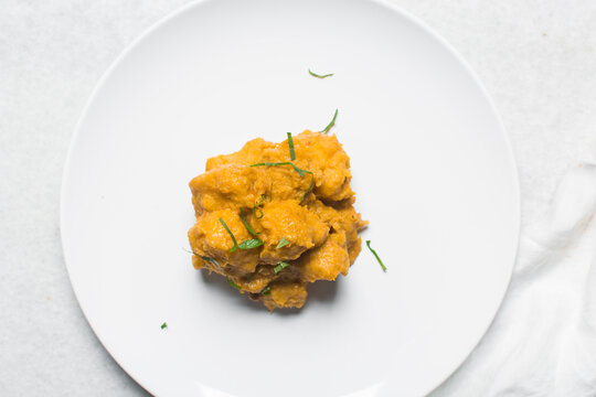 Overhead view of nigerian yam porridge, top view of nigerian asaro on a white background