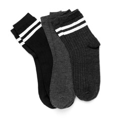 Many different pairs of socks isolated on white, top view