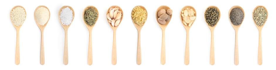 Different aromatic spices in wooden spoons on white background, set. Top view