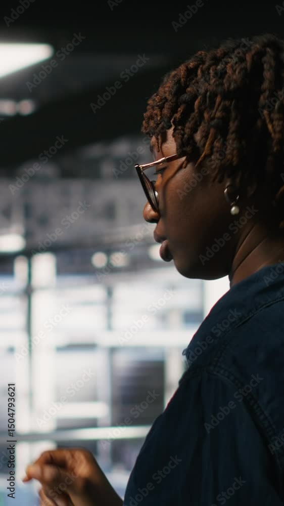 Poster vertical video server farm manager overseeing work done by engineer reviewing neural network code an