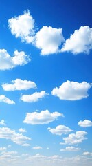 Obraz premium Beautiful blue sky with fluffy white clouds.