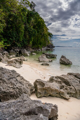 Empty beach with a turquoise water and the limestone rocks of Coron, Palawan, Philippines