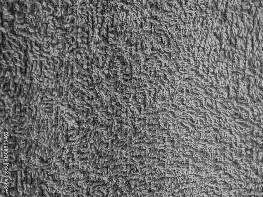 Poster detailed macro shot showcasing the intricate texture of gray terrycloth. this image emphasizes softn
