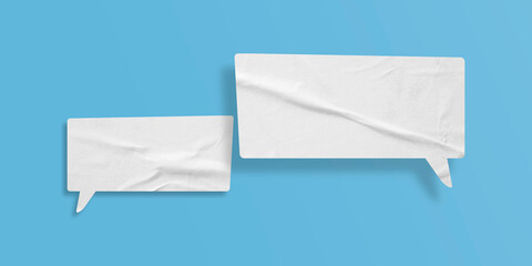 White speech bubble crumpled paper isolated on light blue background