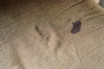 A detailed closeup captures the texture of fabric, revealing the intricate patterns and weaves that...