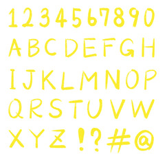 A collection of abc alphabets and numbers drawn with yellow colored pencils and crayon lines on rough surfaces