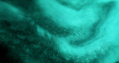 Blur turquoise water. Waves flare. Smooth bright cyan blue sparkling glow bokeh light abstract dark...