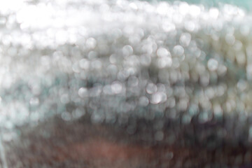 A mesmerizing, blurred backdrop evokes a sense of tranquility and mystery. The interplay of white...