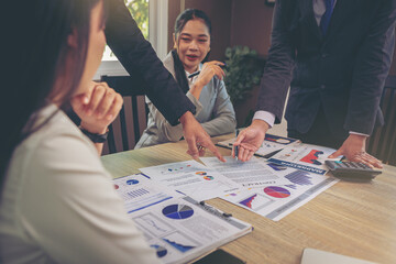 Business peoples meeting to discuss the situation on business plan, marketing for investment....