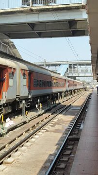 Delhi, India, November 02 2024 - Indian railway express train at departure from Anand Vihar railway station during morning time, Colourful Express train at Delhi railway station