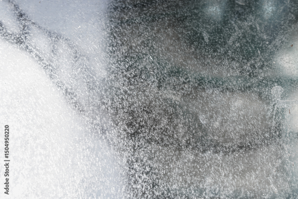 Poster intricate pattern of frozen condensation creates a mesmerizing abstract texture. the play of light a