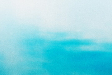 Obraz premium ざらざらの紙とぼやけた穏やかな海の水面