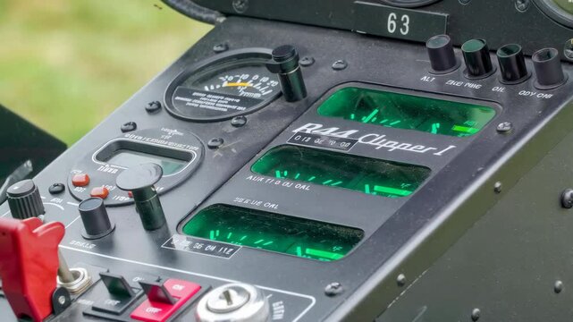 Detailed Control Panel of R44 Clipper I Helicopter Showcasing Various Gauges and Indicators in a Close-Up View