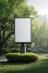 A blank, vertical billboard stands amidst lush greenery, sunlight filtering through trees in a tranquil urban park setting