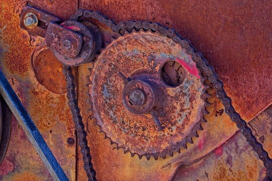 Closeup of a rusty gear and chain on old mining machine. Jerome, Arizona.