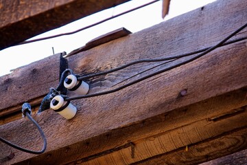 Closeup of knob insulation in old house.