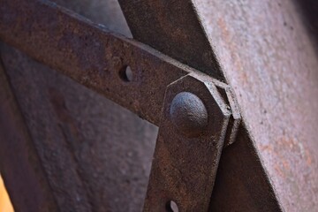 Closeup of a rusted metal girder in the Audrey Headframe in Jerome, Arizona.
