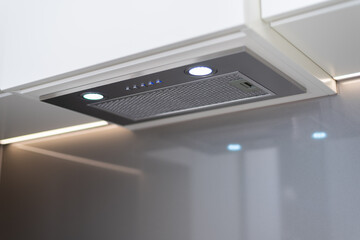A clean range hood in the kitchen