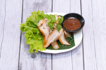 Charcoal-boiled Pork Neck with the Sauce is Spicy Sour Taste is a Popular Appetizer in Thailand.