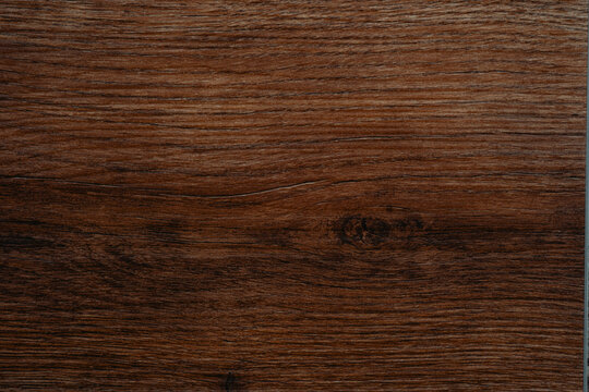 Close-up of vertical wood  texture with rich warm brown tone and deep lines