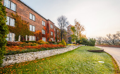 Wawel castle landmark with city view near river in Krakow Poland. Autumn landscape on coast river Wisla.
