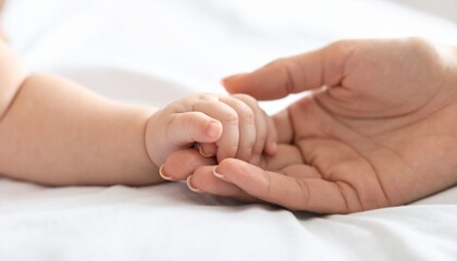 The Delicate Bond A Mother's Touch of Comfort and Care for a Newborn Baby