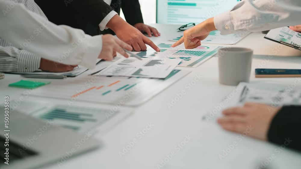 Poster a dynamic business team engages in financial data analysis during a collaborative meeting. various g