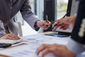 Financial Business Team analyze the graph of the company's performance to create profits and...
