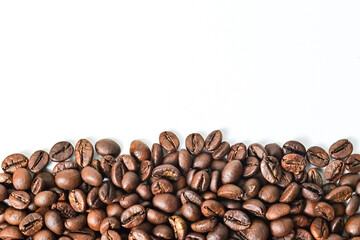 Top view of roasted coffee beans isolated on white background. Texture, detail, background, half, above, high angle, Close up, under, bottom.